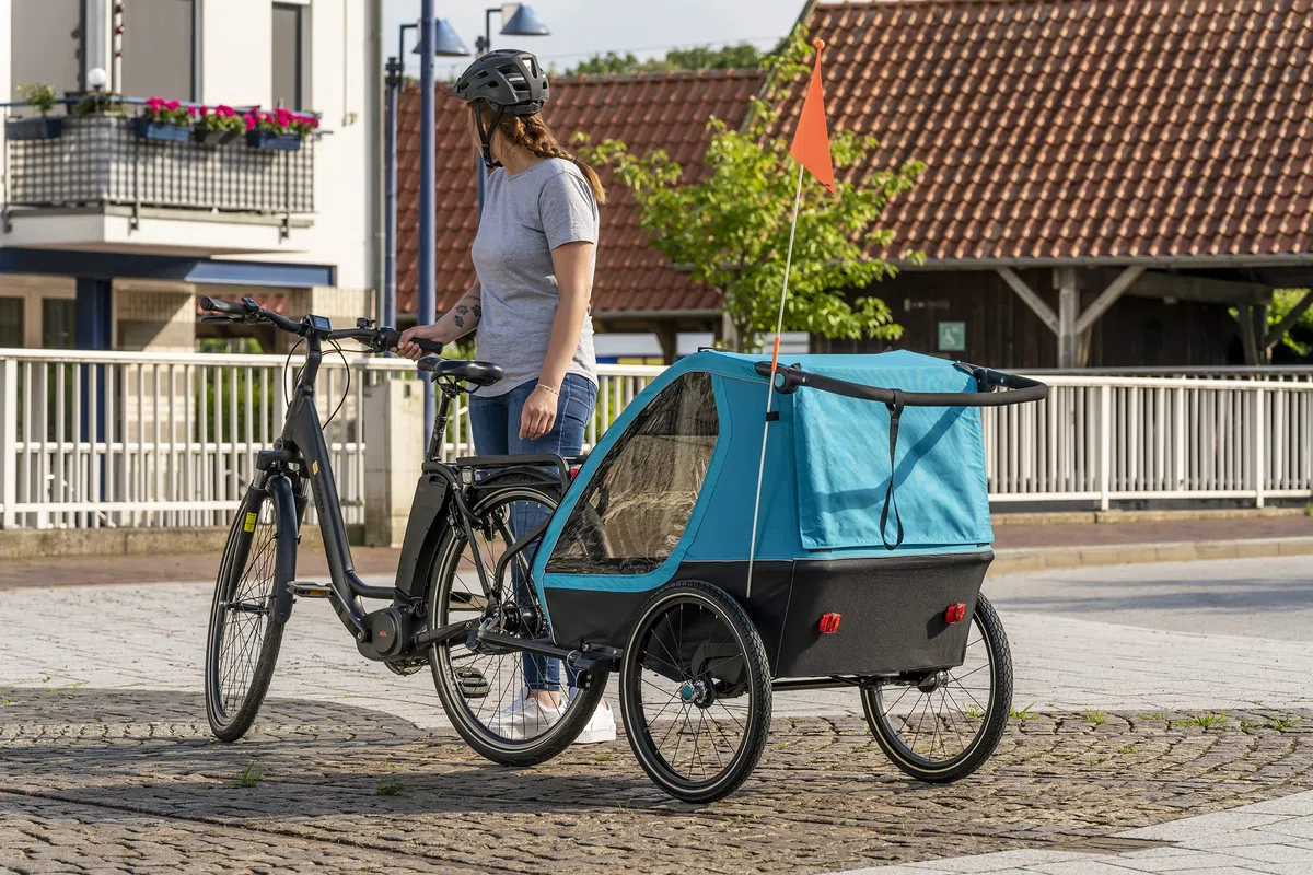 Prophete Kinder-Fahrradanhänger 20", für 1 oder 2 Kinder, zulässiges Gesamtgewicht 60 kg, inkl. vollschwenkbarem Vorderrad, inkl. Joggerrad, Farbe blau/schwarz
