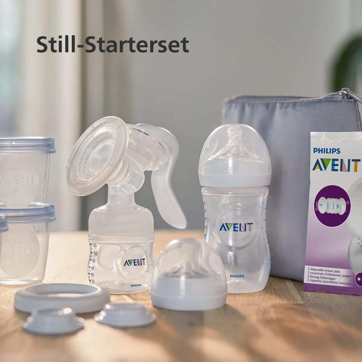 Philips Avent Handmilchpumpe Starter-Set - einfaches Abpumpen, Aufbewahren und Füttern, mit Natural-Motion Technologie, inkl. Babyflasche, Aufbewahrungsbecher und Transporttasche (Modell SCF430/16)