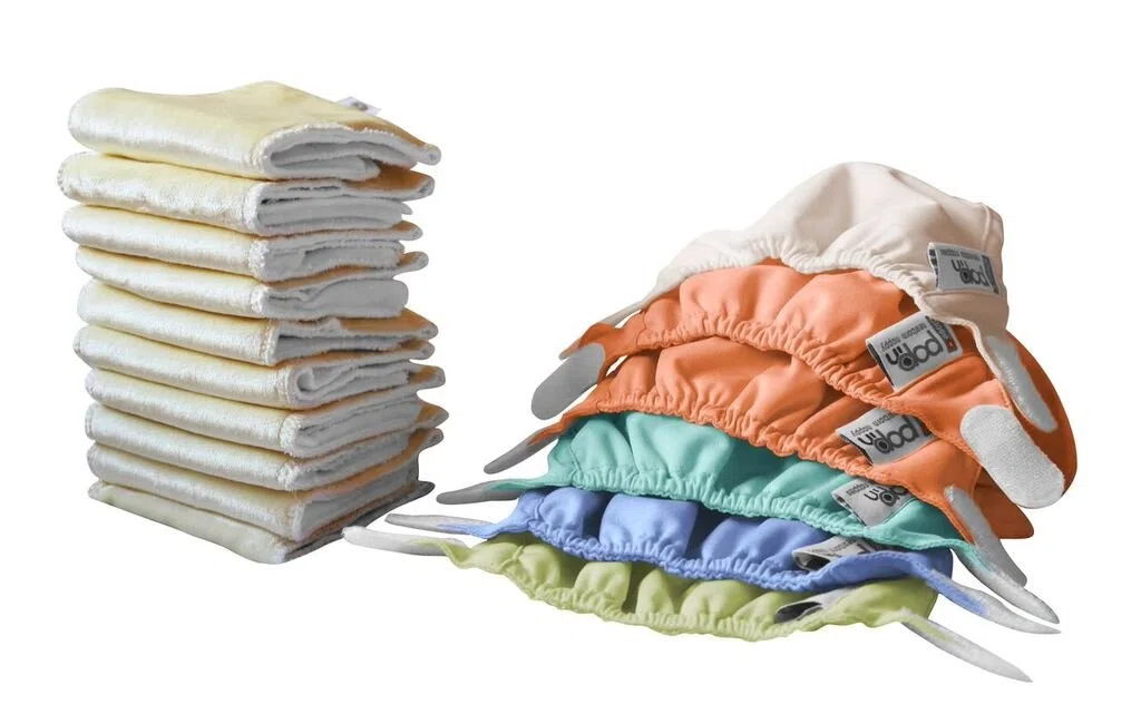 Close Pop-in Stoffwindeln - Newborn Box - farblich sortiert in Pastelltönen - 10 Saugkerne + 6 Außenhüllen