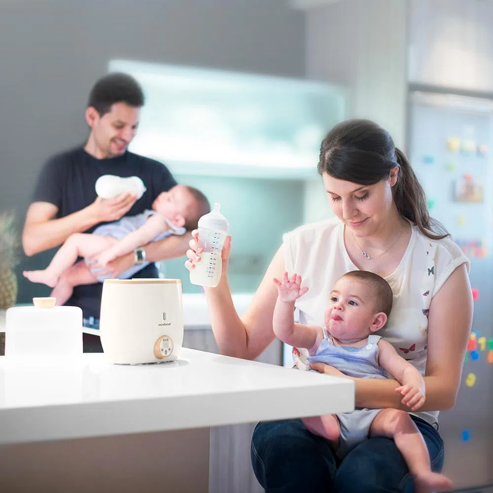 Miniland Warmy Twin Babyflaschen- und Sterilisator, 2-in-1 Schnellerwärmung für Babynahrung, mit Digitalanzeige, präzise Temperaturregelung für Muttermilch (Beige)
